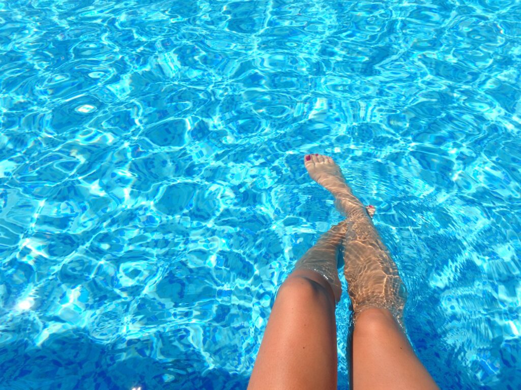 Woman's legs in pool